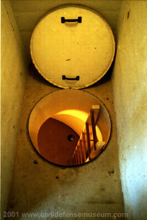 Looking Down Floor Hatch Into Underground Room